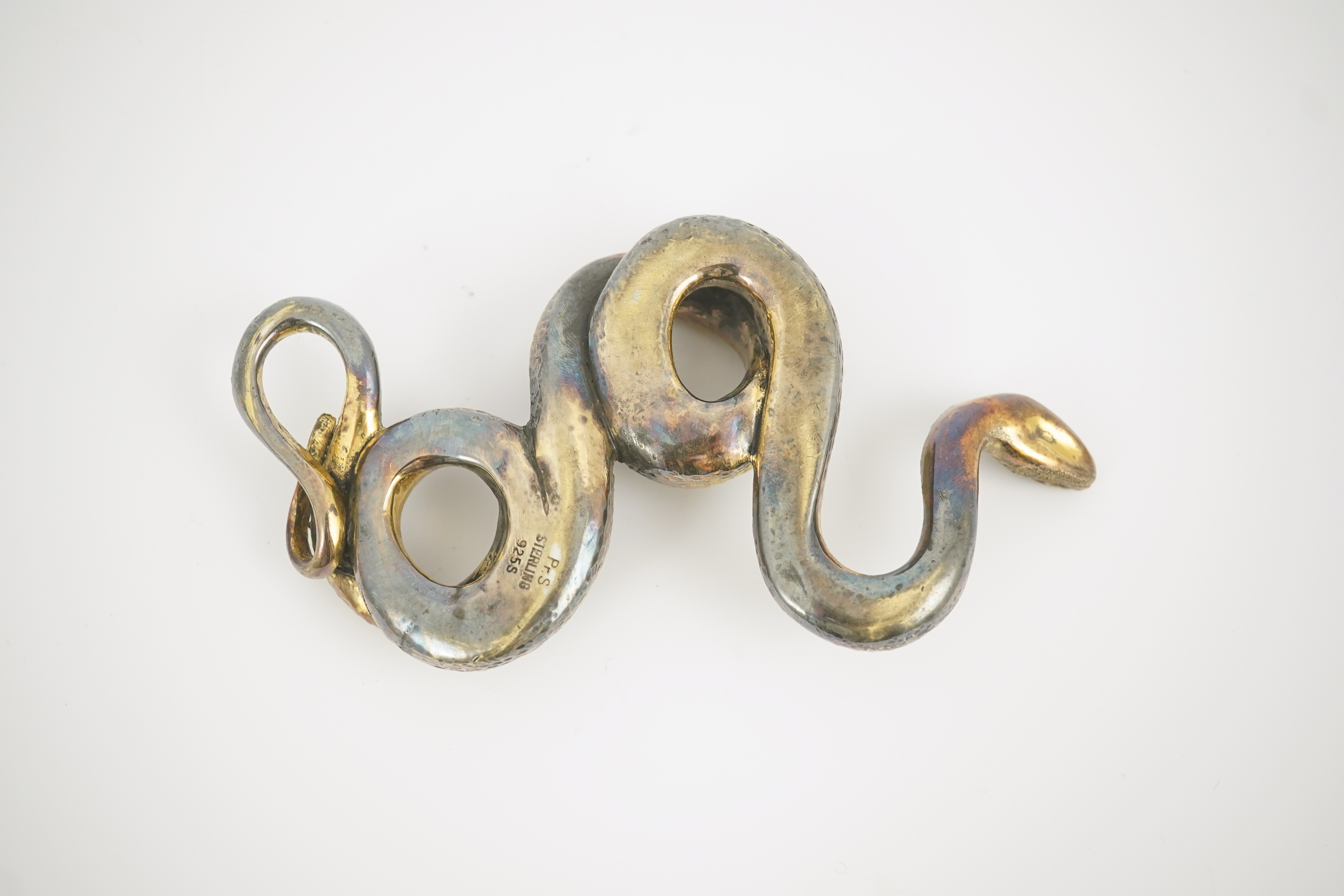 A Sterling silver gilt model of a snake, stamped PR.S